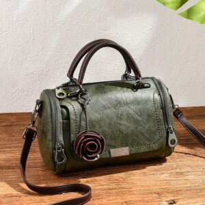 Alternative view of 2026 Frühling neue einfarbige Retro-Kissentasche Damentasche kleine Blumenanhänger Koreanische Version Crossbody Schultertasche Einteiler Dropship